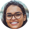 Smiling young girl with big glasses
